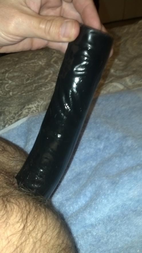 2.5 inches of 10" inside my tight ass, I was so excited as this was MY first BIG dildo!  I flew home from the sex shop, and wore it out for a few hours!!